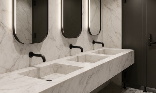 Modern commercial restroom with clean sustainable fixture design
