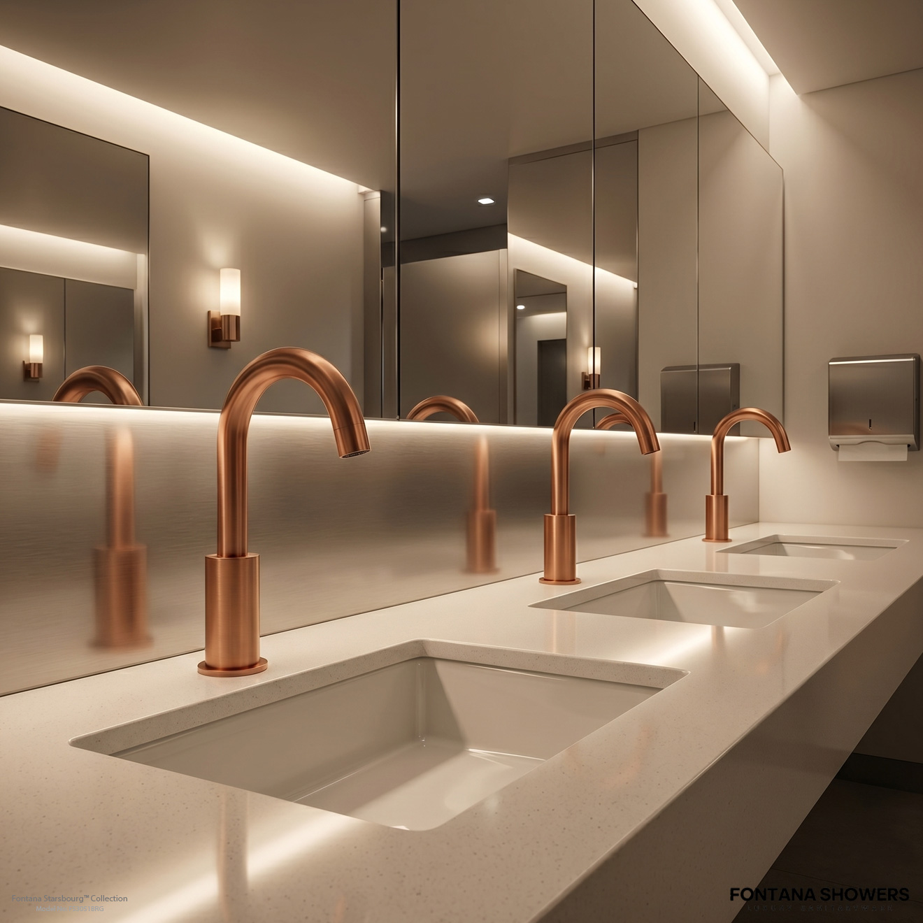 Modern commercial restroom sink deck with touchless sensor faucets and pale blue design accents