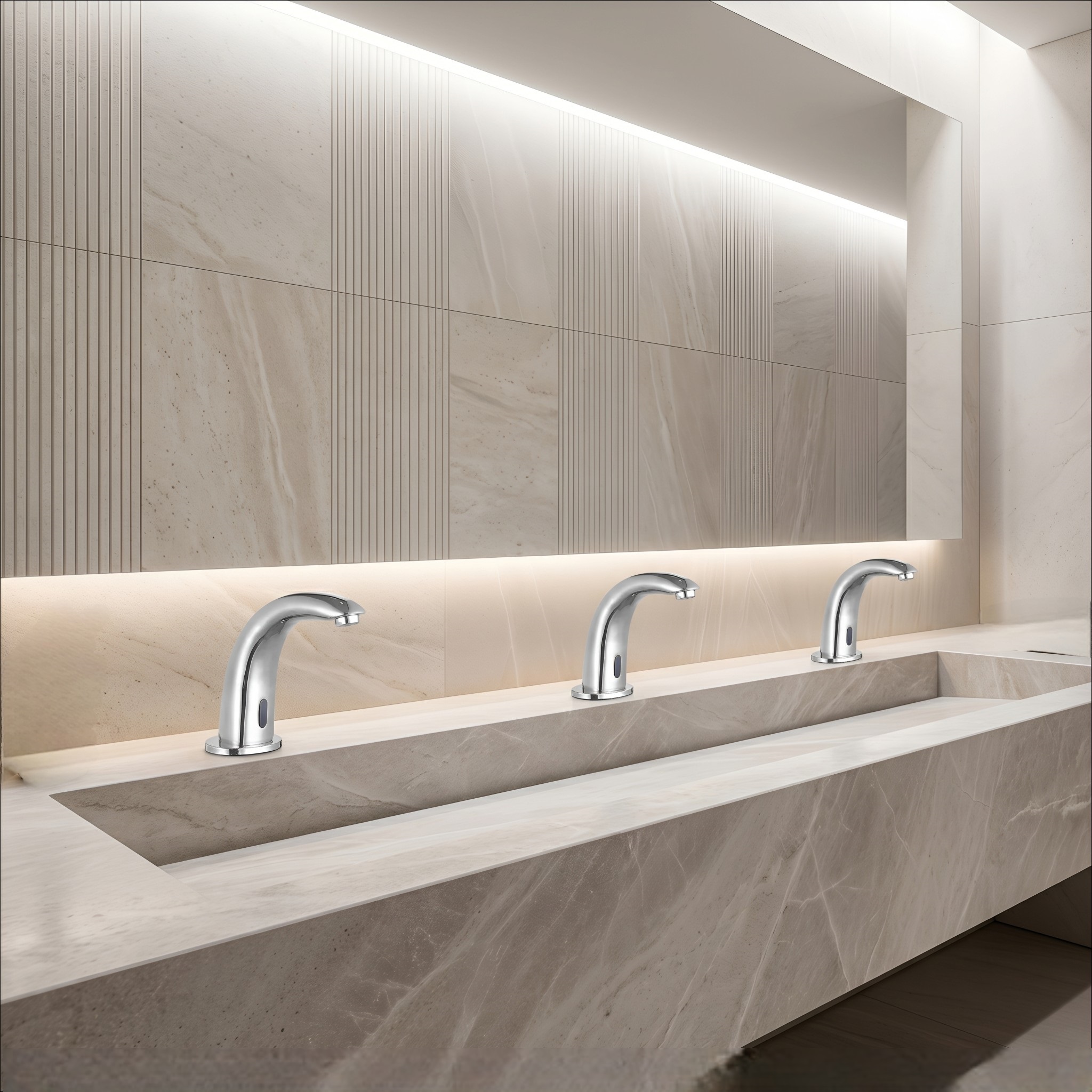 High-traffic stadium restroom with commercial touchless faucets installed along a long counter